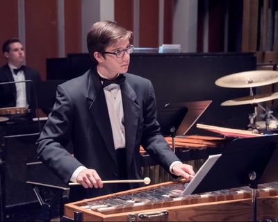 percussion player performs during a band concert