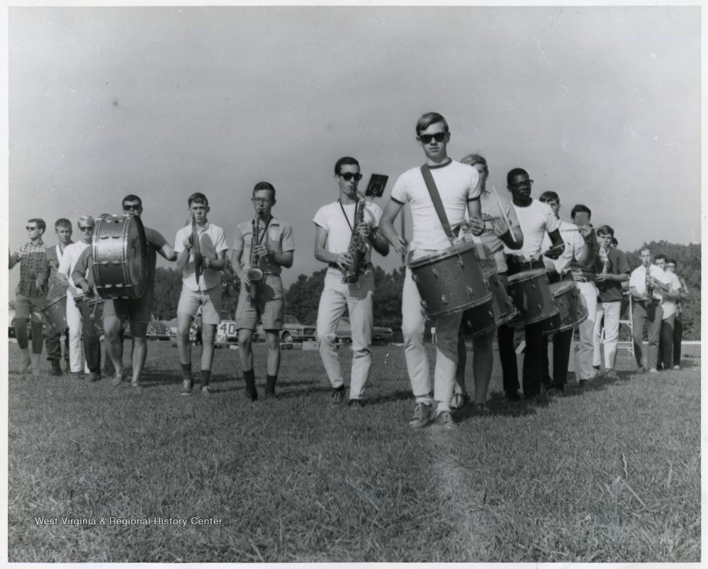marching band on the field in the 1960s
